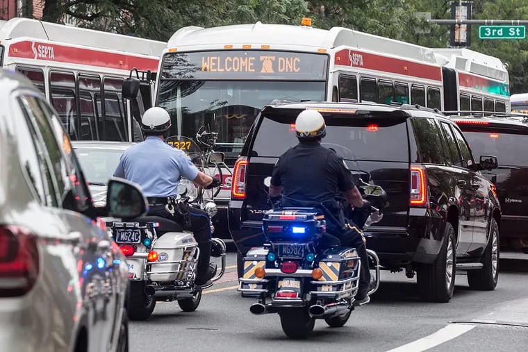 Monday July 25 2016 Snarled traffic which included extra buses and a police escorts clogged Market Street near 3rd during the first day of the DNC convention.