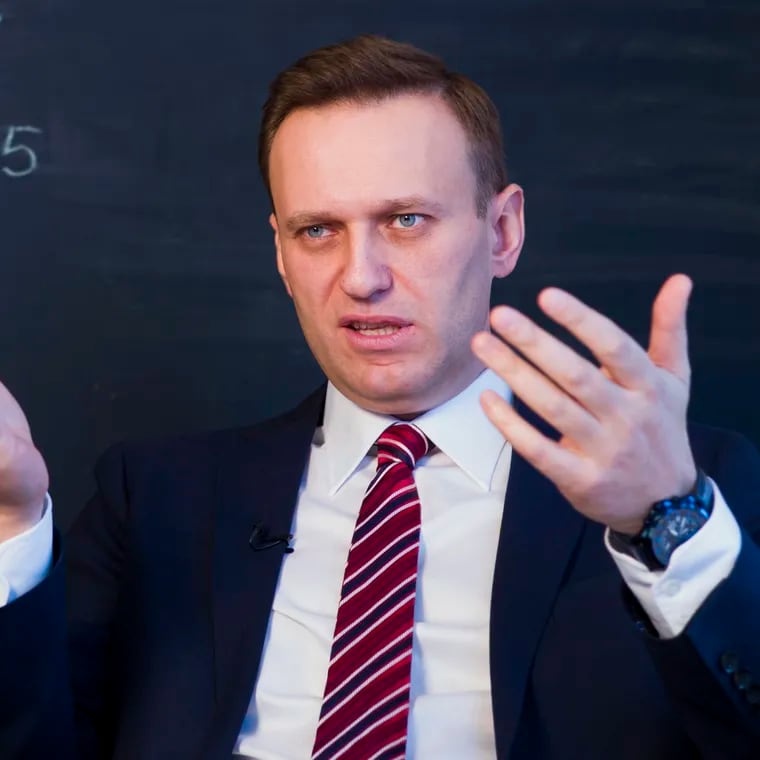 Russian opposition politician Alexei Navalny gestures while speaking during his interview to the Associated Press in Moscow, Russia, on Dec. 18, 2017.