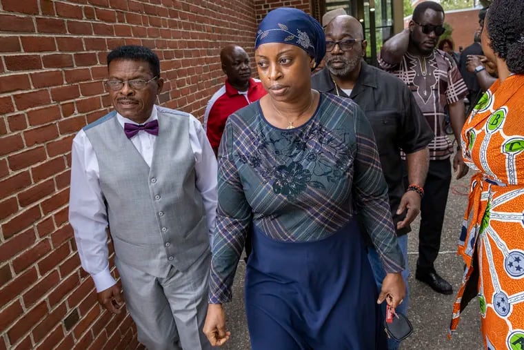 Tennah Kromah, the mother of 8-year-old Fanta Bility leaving Delaware County Courthouse with family after motion for dropping charges denied by judge.