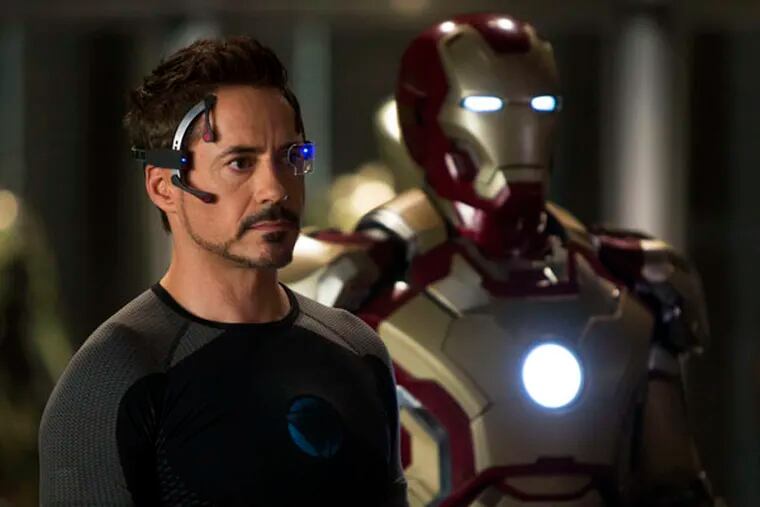 This undated publicity image released by Marvel shows Robert Downey Jr., as Tony Stark/Iron Man, in a scene from "Marvel's Iron Man 3."  (AP Photo/Marvel/Zade Rosenthal)