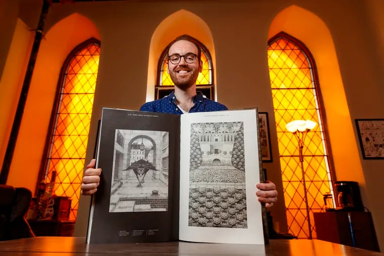 Josh O'Neill, publisher of Beehive Books, shows off the company's first published book, "The Temple of Silence: Forgotten Works & Worlds of Herbert Crowley," with over 300 images of the lost artist's work.