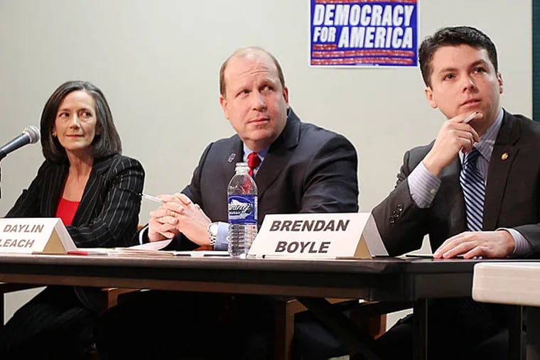 Candidates Dr. Valerie Arkoosh, left, State Sen. Daylin Leach, center, and State Rep. Brendan Boyle,right, pause at the start of the 13th U.S. Congressional District Democratic Forum at the Upper Dublin Township Building in Fort Washington, Pa. on January 26, 2014. ( DAVID MAIALETTI / Staff Photographer )