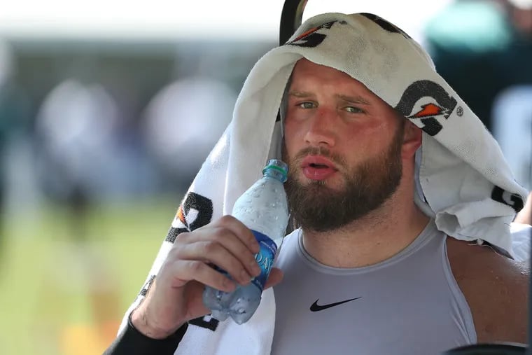 Lane Johnson cools off after the Eagles training camp in Philadelphia on July 30, 2019.