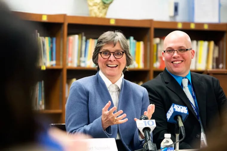 First Lady Frances Wolf and Paul Fly Elementary School principal Jason Smith engage with teachers and administrators Friday, March 13, 2015, at the Norristown school. ( ED HILLE / Staff Photographer )