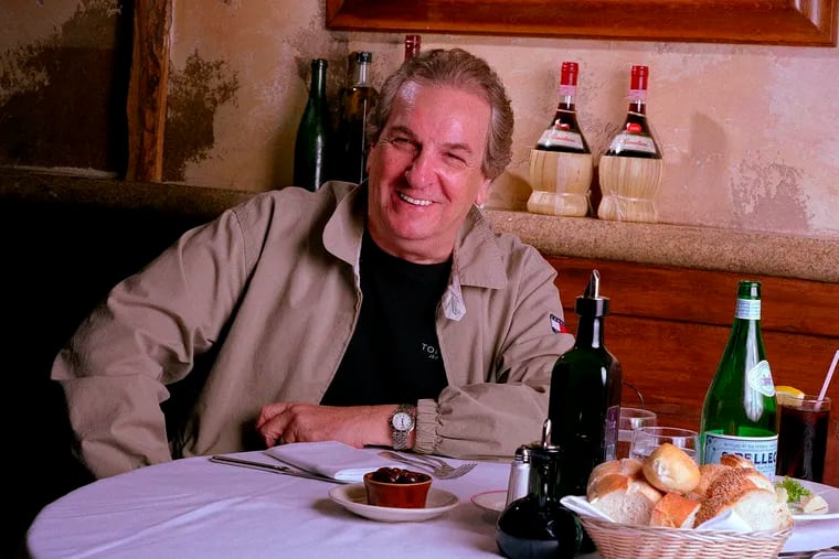 FILE - In this July 28, 2001 file photo, Danny Aiello poses for a photo at Gigino restaurant in New York. Aiello died Thursday, Dec. 12, 2019 after a brief illness, said his publicist, Tracey Miller.