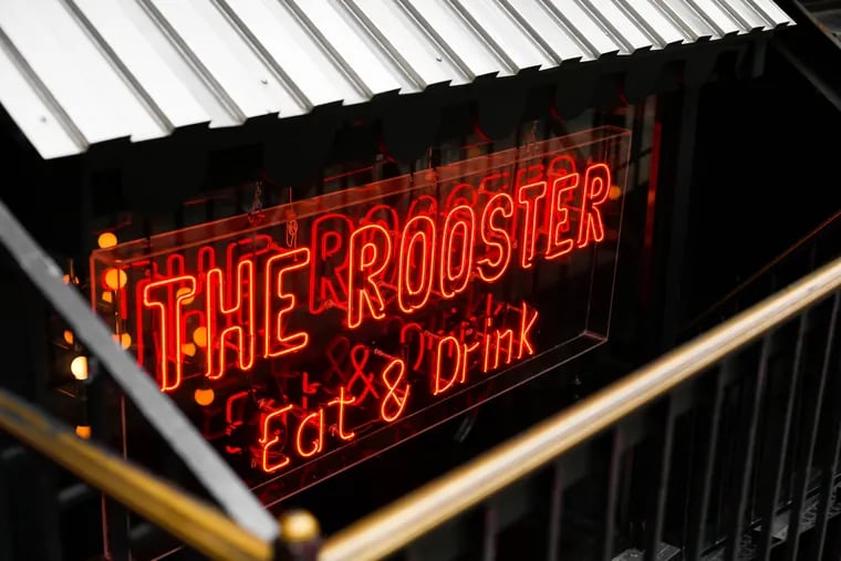 New sign in the window of The Rooster, 1526 Sansom St.