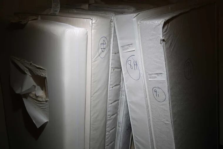 Samples of crib mattresses being taken and prepared for testing for a carcinogenic flame retardant chemical known as TDCPP, or chlorinated tris can be seen at Stat Analysis Laboratory, October 23, 2012, in Chicago, Illinois.