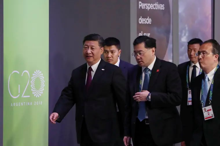 China's President Xi Jinping, left, enters for the start of the G20 summit in Buenos Aires, Argentina, Friday, Nov. 30, 2018. Heads of state from the world's leading economies were invited to the Group of 20 summit to discuss issues like development, infrastructure and investment, but those themes seem like afterthoughts, overshadowed by contentious matters from the U.S.-China trade dispute to the conflict over Ukraine. (AP Photo/Ricardo Mazalan)