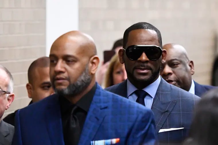 Musician R. Kelly arrives at the Daley Center for a hearing in his child support case at the Daley Center, Wednesday, March 6, 2019, in Chicago.