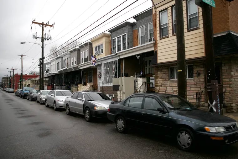 The 3300 block of Emerald Street in Philadelphia's Kensington neighborhood on Friday, hours after police fatally shot a man after he allegedly fired shots into a crowd, killing one teenager and injuring another.