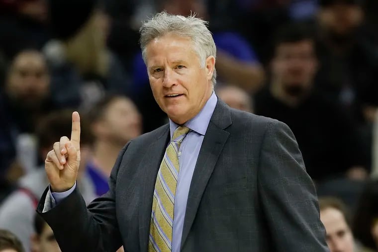 Brett Brown raising a finger to his team during a December game against the Wizards.