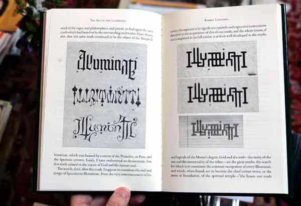 Ambigrams designed by Langdon are inside one of the few books, titled, "The Art of the Illuminati". by Robert Langdon. that the production company made to be in the movie. ( Bonnie Weller / Staff ) 5/19/09. DM1LANG21	Profile of John Langdon, Drexel prof who was inspiration for hero of Da Vinci Code, Angels & Demons. He designs elaborate ambigrams -- word symbols.