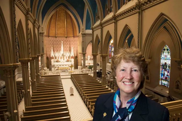 Sister Anne Myers shows the chapel on the Chestnut Hill College campus. CLEM MURRAY / Staff Photographer