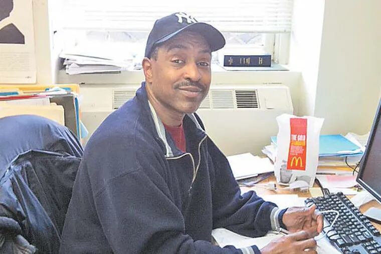 Darnell Hendrix, 46, lost his insurance coverage when he lost his machinist job at Wonder Bread/Hostess when the company shut down last year. He is volunteering at the Philadelphia Unemployment Project.