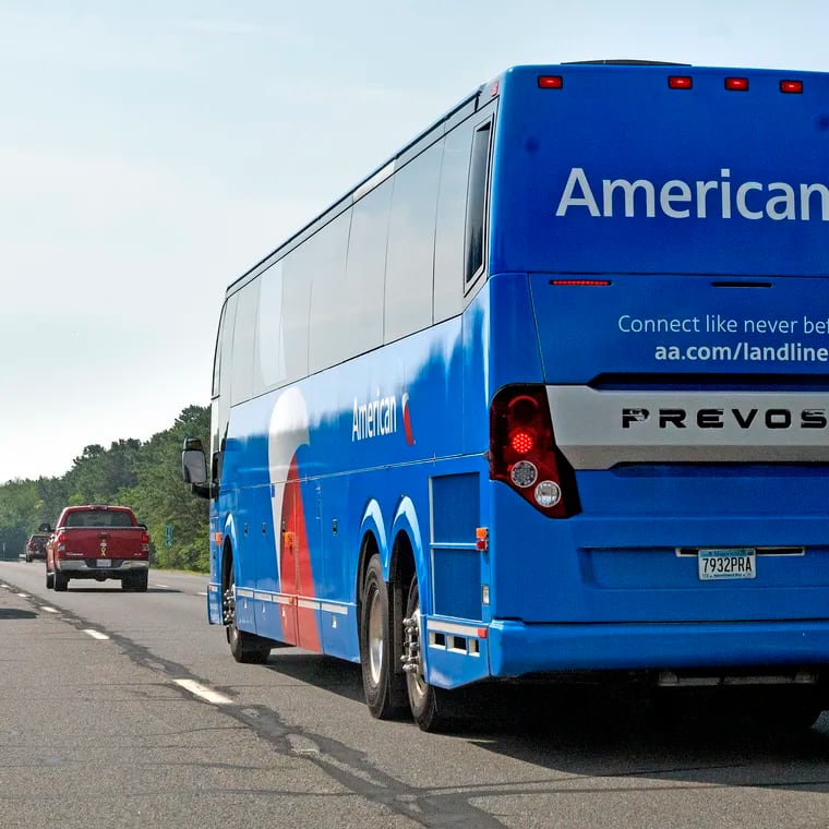 An American Airlines motorcoach operated by Landline travels on the Atlantic City Expressway.