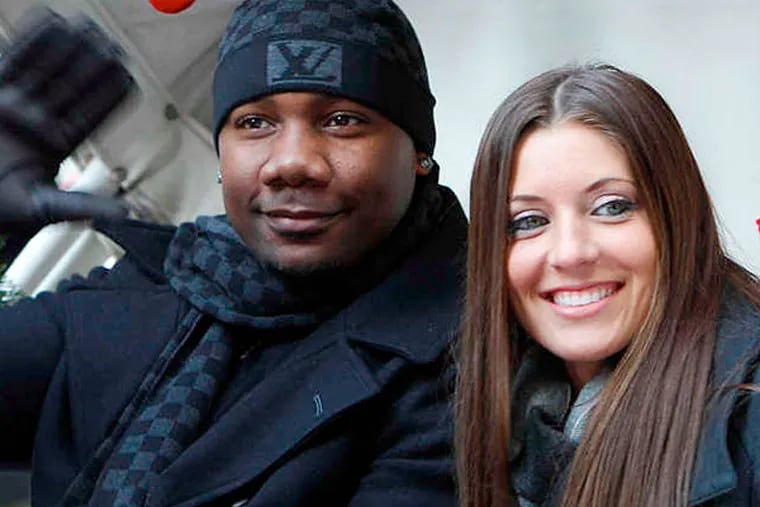Ryan Howard and Krystal Campbell at the 2012 Thanksgiving Day Parade in Center City. (DAVID MAIALETTI / Staff Photographer)