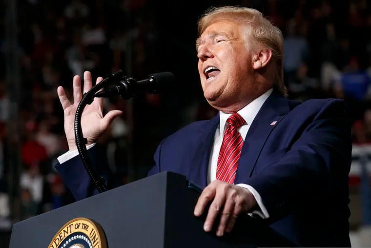 President Donald Trump speaks at a campaign rally in North Charleston, S.C. Speaking to thousands of his supporters, Trump vowed to do everything possible to “destroy” the image of Comcast.