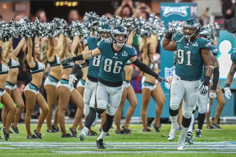 The Eagles re-signed Zach Ertz (center) and Fletcher Cox in the 2016 offseason. Two years later, they had a Lombardi Trophy.