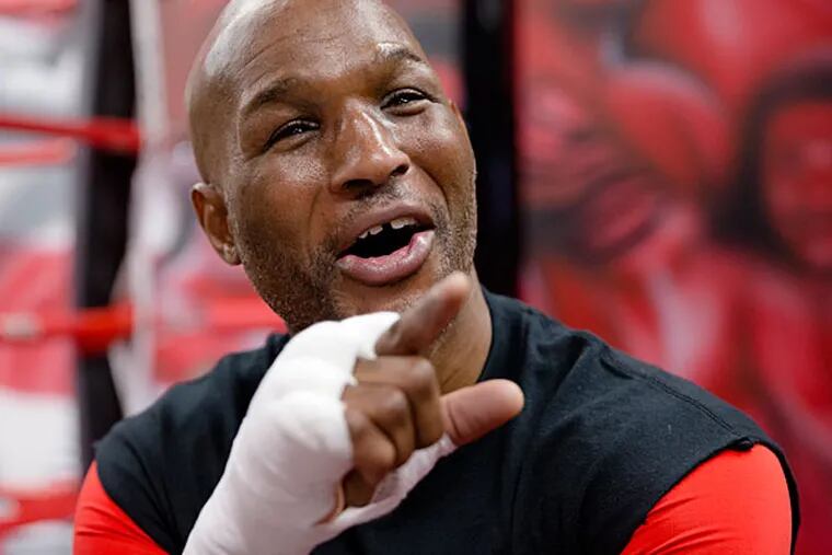 IBF light heavyweight boxing champion Bernard Hopkins speaks with reporters during a media workout Thursday, April 10, 2014, in Philadelphia. Hopkins will attempt to become the oldest fighter in boxing history to unify world titles when he opposes WBA champion Beibut Shumenov April 19th at the DC Armory. (Matt Rourke/AP)