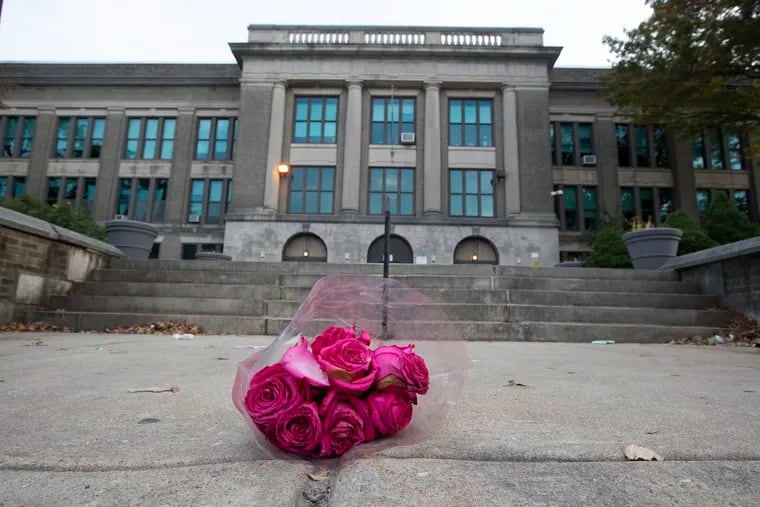 A bouquet of roses outside of Roxborough High School.