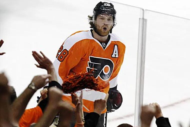 "[Claude Giroux] did the right things off the ice to become the player he is,” Paul Holmgren said. (Alex Brandon/AP)