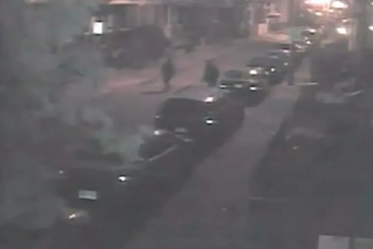 Two suspects seen walking down the street that are wanted for their involvement in slashing 56 tires overnight in West Philadelphia, police said.