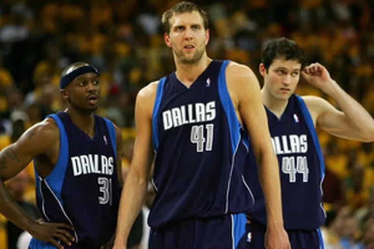 So long, Mavericks. Dallas was upset by Golden State in the opening round of the playoffs, leaving (from left) Jason Terry, Dirk Nowitzki and Austin Croshere to wonder what went wrong.