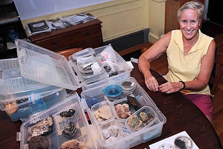 Judy Michel of Ardmore with her lava samples. She taught middle school for 37 years, now teaches 'seasoned adults.'