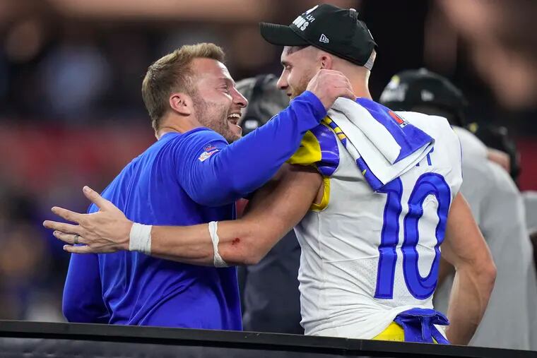Los Angeles Rams coach Sean McVay celebrates with wide receiver Cooper Kupp (10) after defeating the Cincinnati Bengals in the Super Bowl.
