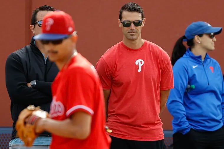 Phillies director of player development Preston Mattingly (center) wants players in their Dominican Republic academy "to get the same opportunities the kids in the States do."