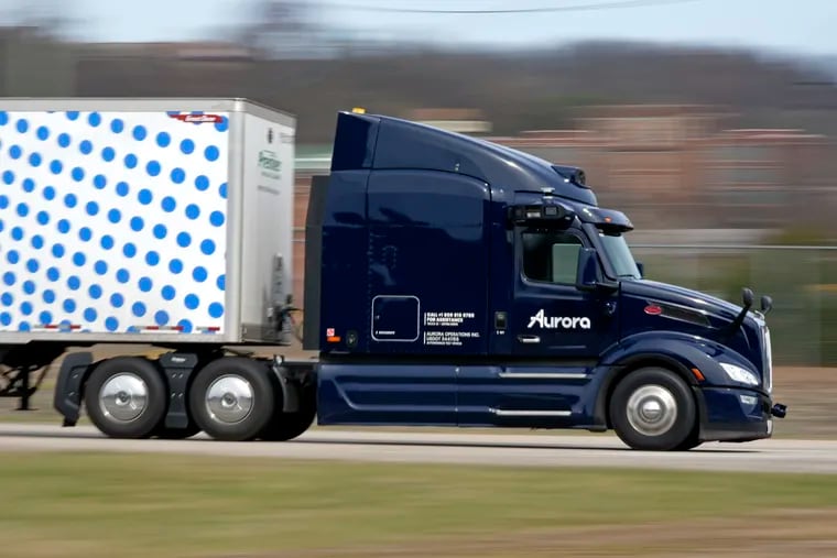 A self-driving tractor trailer maneuvers around a test track in Pittsburgh in March.