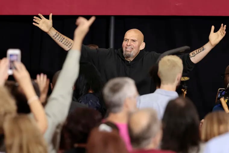 Pennsylvania Lt. Gov. and U.S. Senate candidate John Fetterman (D) interacts with supporters after his rally in Blue Bell Sunday.