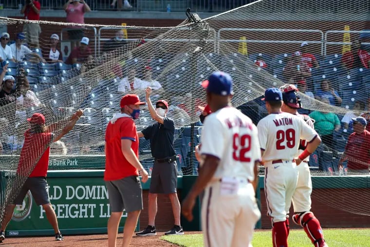The net behind home plate collapsed during the top of the eighth inning at the Philadelphia Phillies game against the Washington Nationals at Citizens Bank Park in Philadelphia, Pa. on Sunday, June 6, 2021. It caused a long delay.