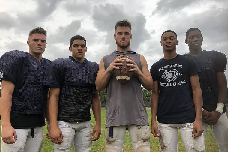Timber Creek quarterback Devin Leary (center) with receivers (from left) Mike Johnson, Jayvin Little, Tarheeb Still and Jordan Nash.