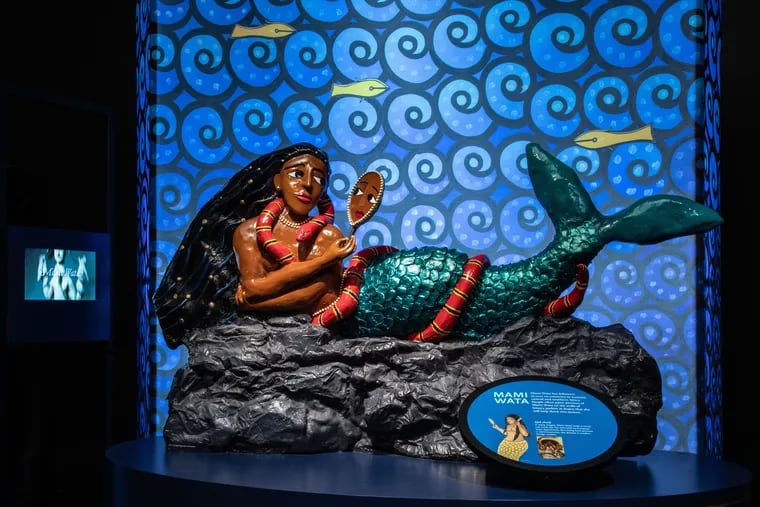People around the world tell of water creatures that are half-fish and half-human. Mami Wata is one of the most popular African water spirits.<br/>
© AMNH