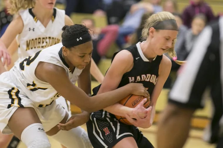Haddonfield's Mary Kelly pulling down a rebound in a victory over Moorestown last season.