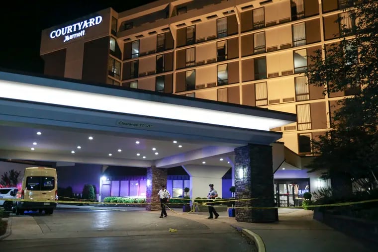 Police on the scene at the Courtyard by Marriott on Presidential Boulevard where a man was shot, Monday, July 26, 2021.