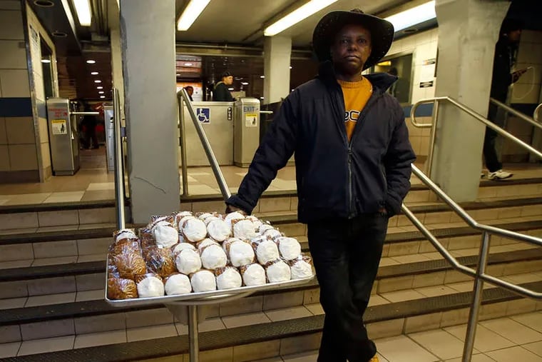 It becomes a joyride on SEPTA when Vernon Wilkins shows up. He started selling his carrot cake on the transit system when his brick-and-mortar store closed in 1996. He says, &quot;Everything in my life has set me up to be the Carrot Cake Man.&quot; YONG KIM / STAFF PHOTOGRAPHER