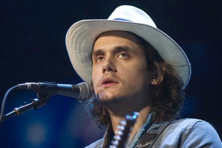 John Mayer performs during Tiger Jam, Saturday, (AP)