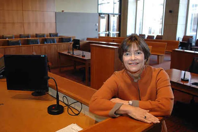 Pro bono work &quot;is both good and the right thing to do,&quot; says Eve Biskind Klothen, assistant dean of the Rutgers-Camden Law School. Klothen, in the school&#0039;s moot courtroom, has won a national award for her contributions to free legal services.