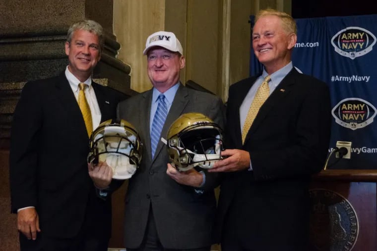 Mayor Kenney, sporting an “Arvy” cap in support of both teams, stands between Chet Gladchuk (left), Navy athletic director, and Boo Corrigan, Army athletic director, at Tuesday’s announcement.