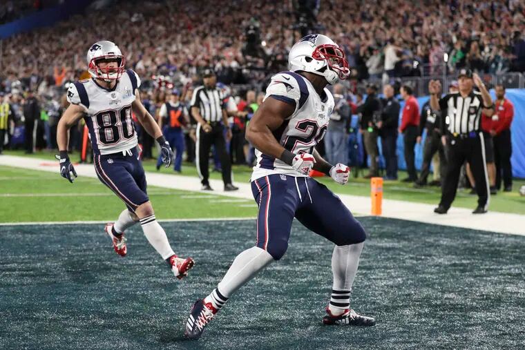 Patriots running back James White, shown here in last year's championship, has scored four touchdowns total in the last two Super Bowls. Will he score the first one on Sunday?