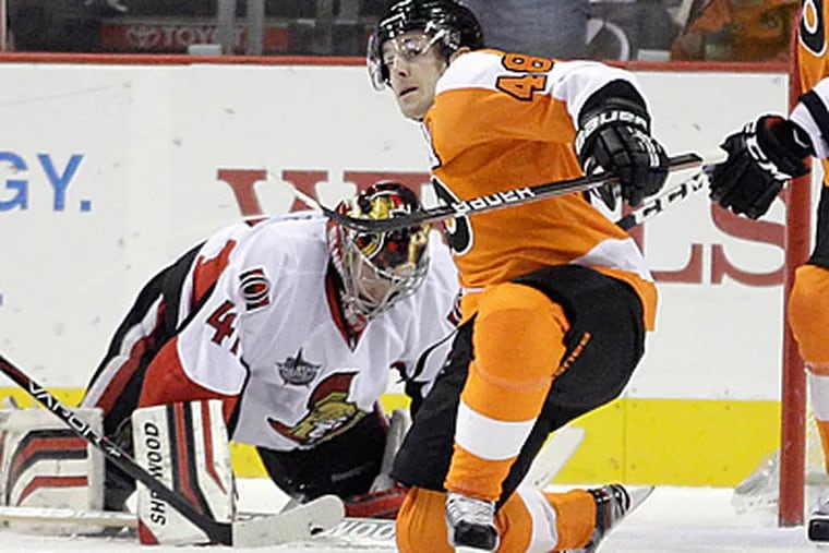 Danny Briere has stepped up his game since his meeting with Peter Laviolette. (AP Photo/Matt Slocum)