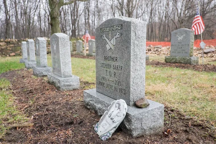 This gravestone shows where a Catholiic friar, Stephen Baker, was buried after the serial abuser took his life at a Pennsylvania monastery in January 2013. This March 15, 2016, photo was taken after Baker was named, posthumously, in a Pennsylvania grand jury report.