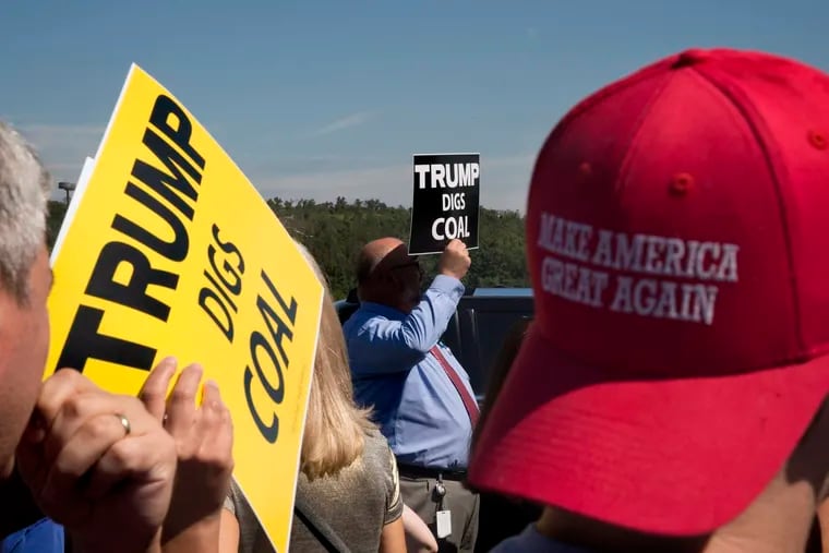In September, supporters wait for Donald Trump, Jr. to speak in the parking lot during the grand-opening of a Trump campaign headquarters near Canonsburg,