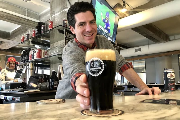 CEO Dan Hershberg at Workhorse Brewing's bar outlet at Spread Bagelry, 2401 Walnut St.