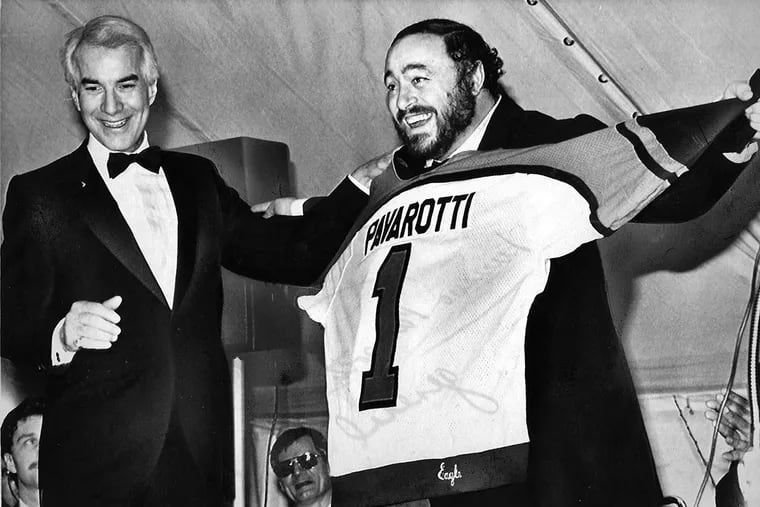 World-famous tenor Luciano Pavarotti sports a Flyers' jersey given to him by team owner Ed Snider during a champagne reception following a Spectrum concert March 15, 1985.