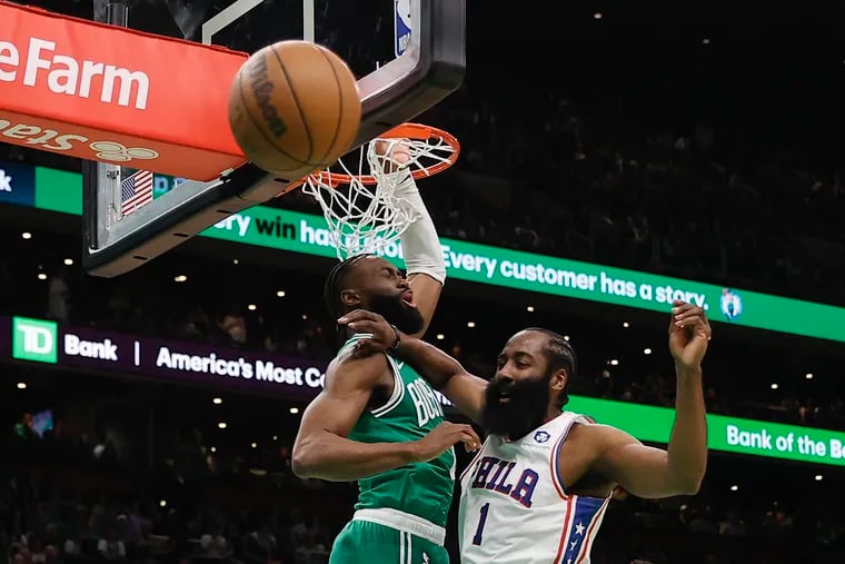 Sixers guard James Harden loses the basketball against Boston Celtics guard Jaylen Brown during Game 7 of the Eastern Conference semifinal playoffs in Boston on Sunday, May 14, 2023.