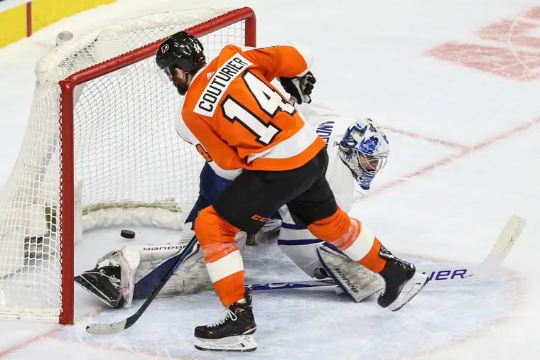 Flyers' Sean Couturier scores on Maple Leafs' goalie Frederik Andersen during the shootout at the Wells Fargo Center, Wednesday,  March 27, 2019.Flyers beat the Maple Leafs 5-4 in a shootout.