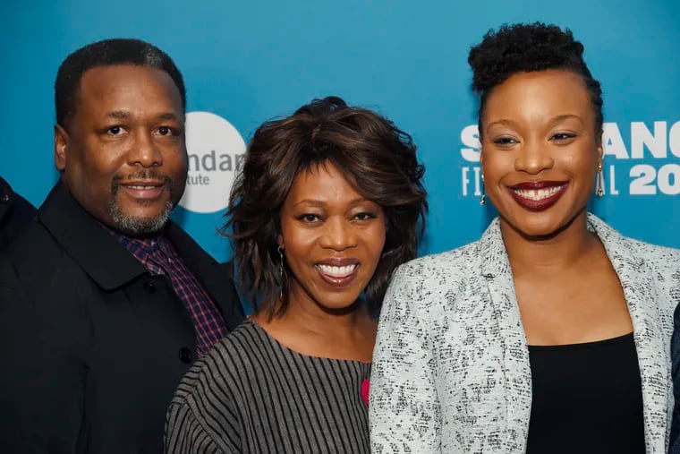 Chinonye Chukwu, right, writer/director of "Clemency," poses with cast members Alfre Woodard, center, and Wendell Pierce at the premiere of the film at the during the 2019 Sundance Film Festival, Sunday, Jan. 27, 2019, in Park City, Utah.